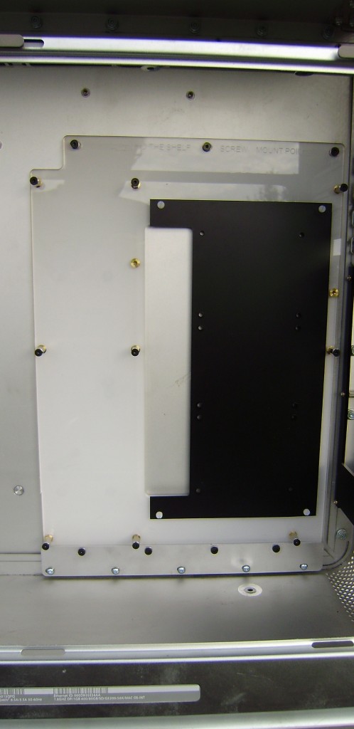 Tray mounted in a G5 and ready to accept up to 3 SSD drives under the motherboard. 